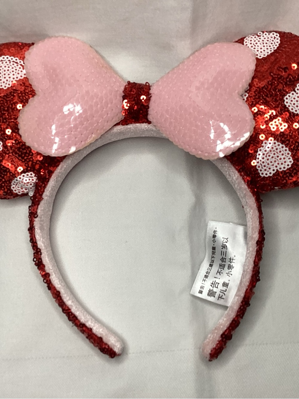 Disney womens Sequin Heart Ear Headband with Pink Bow